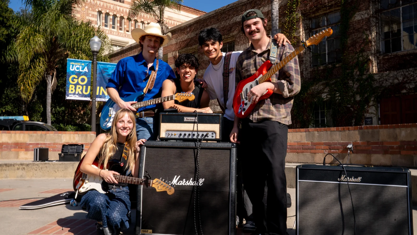 South of Sober posing together with their guitars and Marshall amplifiers at UCLA